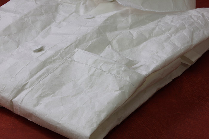 Shirt made from 34gsm Zairei Japanese paper, white paper buttons, white thread and glue. 22 x 33 x 2 cm