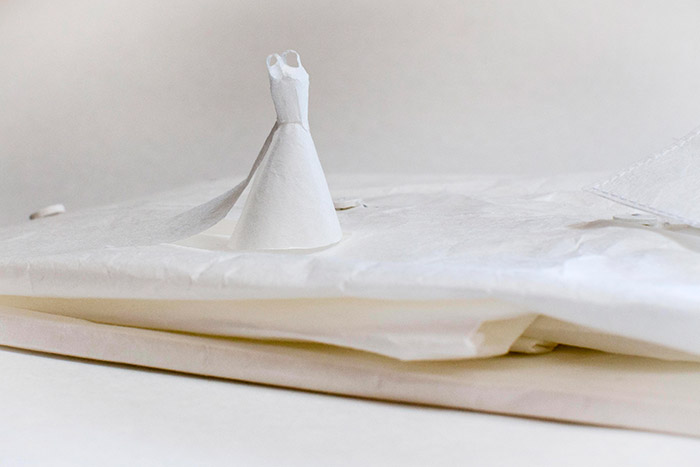 Shirt made from 34gsm Zairei Japanese paper, white paper buttons, white thread and glue. 22 x 33 x 6 cm