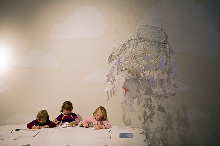 Angel workshop: A4 paper, pencil, scissors, and thread
Himmelrum, Kunsthallen Nikolaj
<br>
In the Angel workshop children and adults alike were invited to reflect on life, death, and the exhibition they had just experienced, by cutting their own angels and making wishes on them. At the end of the show angels were sent to heaven on balloons in a well-visited event outside the exhibition building.